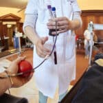 A-nurse-collects-samples-at-a-blood-donation-centre-during-the-outbreak-of-the-coronavirus-disease