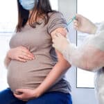 CDC Urges Pregnant Women to Get COVID-19 Vaccine As Deaths Hit New Record
